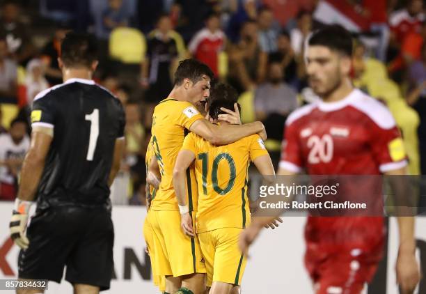 Robbie Kruse of Australia celebrates after scoring a goal during the 2018 FIFA World Cup Asian Playoff match between Syria and the Australia...