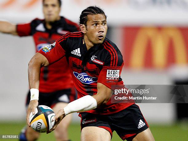 Casey Laulala of the Crusaders looks to pass during the round eight Super 14 match between the Crusaders and the Bulls at AMI Stadium on April 3,...