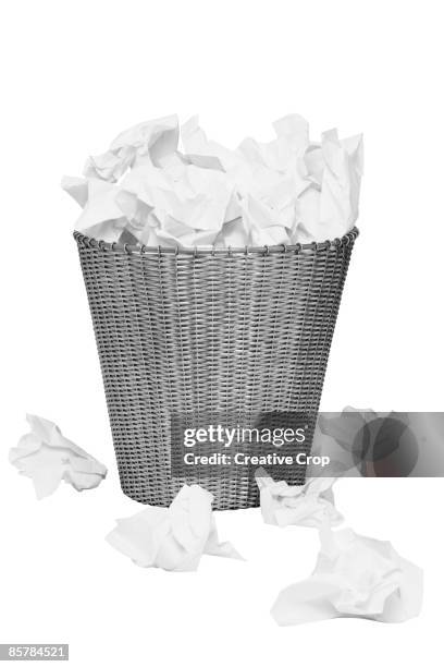 overflowing alluminium wastepaper  - waste basket stock pictures, royalty-free photos & images