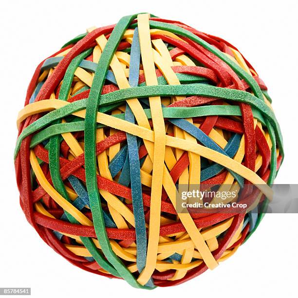 rubber ball made from multicolored elastic bands  - elastic band ball stock pictures, royalty-free photos & images