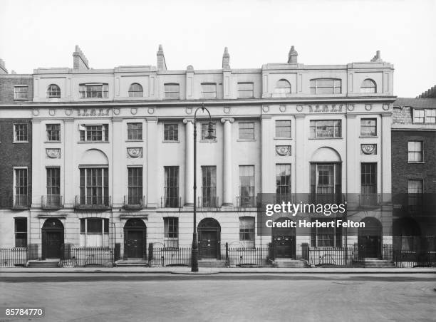 Mecklenburgh Square in Camden, London, where it joins Doughty Street , circa 1925.