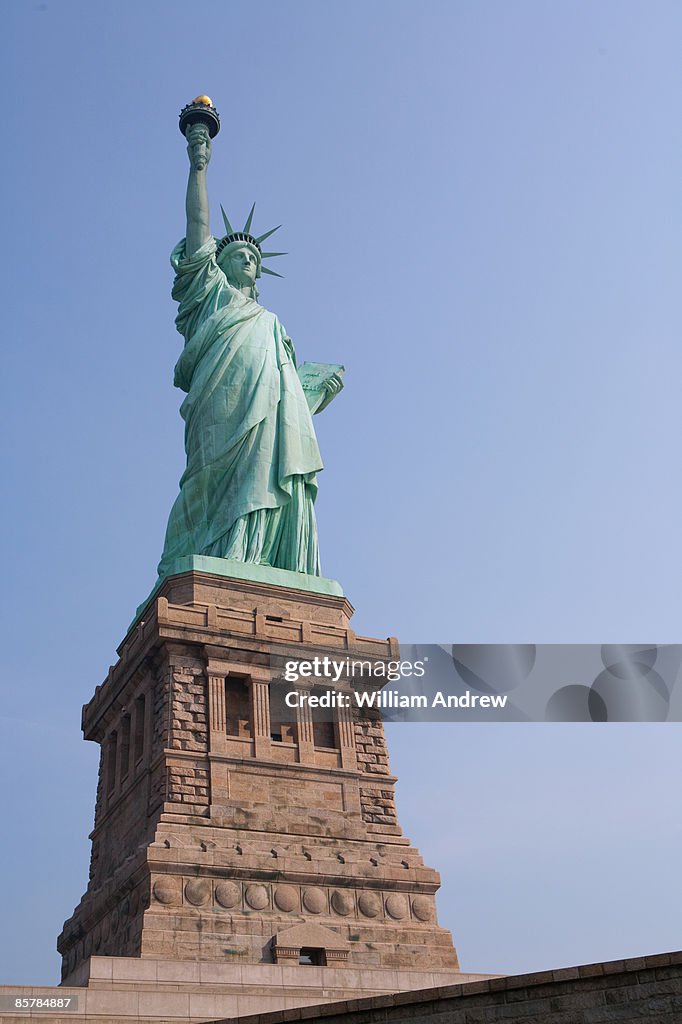 Statue of Liberty with clear blue sky, low angle