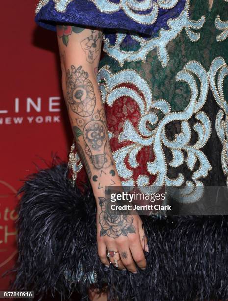 Julie Michaels accessory and tattoo detail during People's "Ones To Watch" at NeueHouse Hollywood on October 4, 2017 in Los Angeles, California.