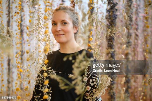 Artist Rebecca Louise Law poses with her new installation "Life in Death" at Kew Gardens on October 5, 2017 in London, England. The artwork,...