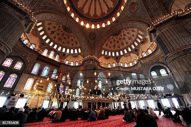 Muslims wait for friday prayers at the Blue Mosque in Istanbul on April 3, 2009. US President Barack Obama will visit the Blue Mosque and the St...