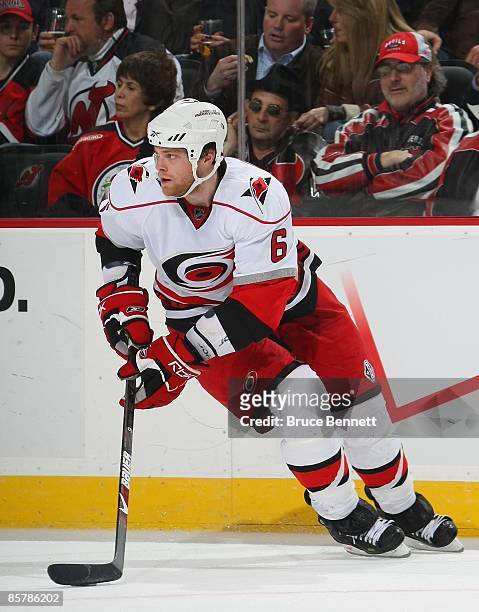 Tim Gleason of the Carolina Hurricanes skates against the New Jersey Devils on March 28, 2009 at the Prudential Center in Newark, New Jersey.