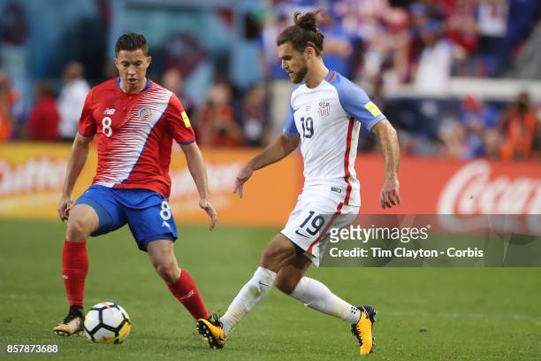 Graham Zusi of the United States challenged by Bryan Oviedo of Costa Rica during the United States Vs Costa Rica CONCACAF International World Cup...