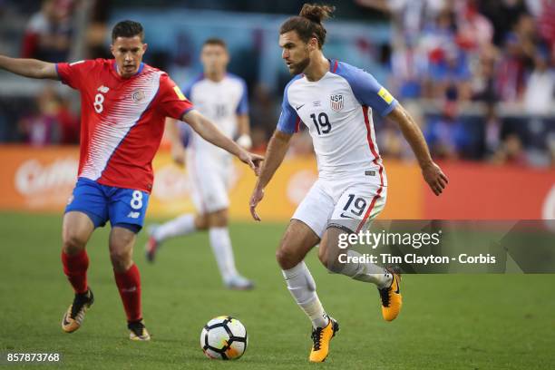 Graham Zusi of the United States challenged by Bryan Oviedo of Costa Rica during the United States Vs Costa Rica CONCACAF International World Cup...