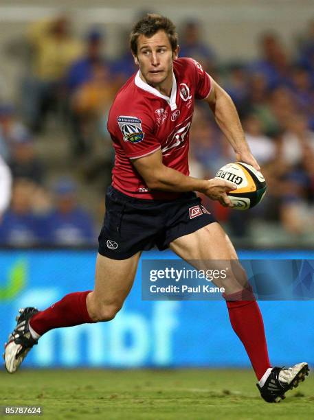 Mark McLinden of the Reds passes the ball during the round eight Super 14 match between the Western Force and the Reds at Subiaco Oval on April 3,...