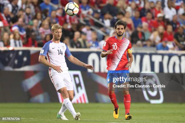 Bryan Ruiz of Costa Rica is challenged by Tim Ream of the United States during the United States Vs Costa Rica CONCACAF International World Cup...