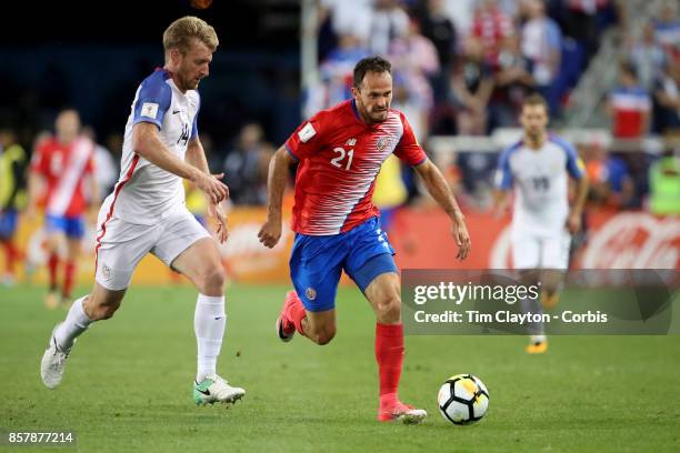 Tim Ream of the United States challenges Marcos Urena of Costa Rica during the United States Vs Costa Rica CONCACAF International World Cup...