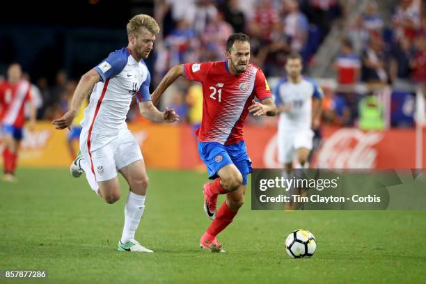 Tim Ream of the United States challenges Marcos Urena of Costa Rica during the United States Vs Costa Rica CONCACAF International World Cup...