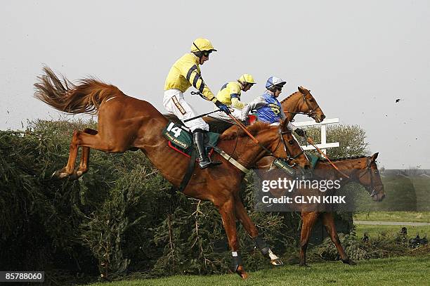 Horses jump Bechers Brook during The Topham Steeple Chase, on the second day of the Grand National meeting at Aintree Racecourse in Liverpool,...