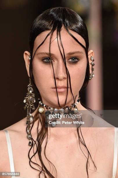 Model walks the runway during the Alexander McQueen Paris show as part of the Paris Fashion Week Womenswear Spring/Summer 2018 on October 2, 2017 in...