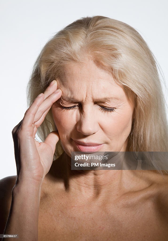 Mature Woman with headache 