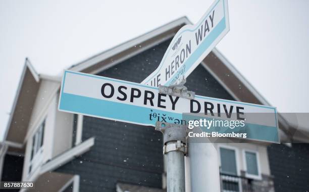 Street signs are seen at the Tsawwassen Shores residential development in Tsawwassen, British Columbia, Canada, on Wednesday, Feb. 8, 2017. The new...