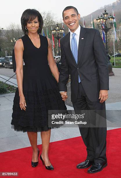 President Barack Obama and his wife Michelle arrive at the opening of the NATO summit at the Kurhaus on April 3, 2009 in Baden Baden, Germany. Heads...