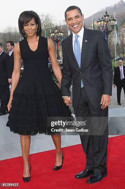 President Barack Obama and his wife Michelle arrive at the opening of the NATO summit at the Kurhaus on April 3, 2009 in Baden Baden, Germany. Heads...