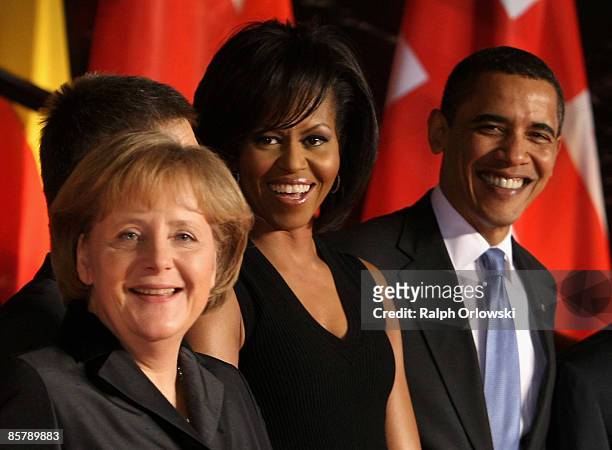 German Chancellor Angela Merkel, her husband Joachim Sauer, U.S. President Barack Obama and his wife Michelle meet for a social program before a NATO...
