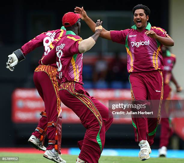 Ravi Rampaul of The West Indies celebreates the wicket of Andrew Strauss during The 5th One Day International between The West Indies and England...