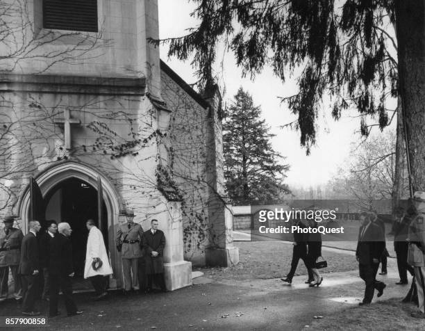 American US President John F Kennedy and First Lady Jacqueline Kennedy walk arm-in-arm as they arrive at St James Episcopal Church for former First...