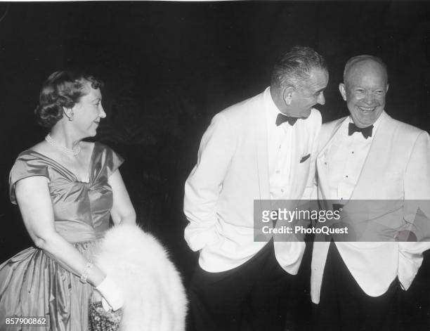 Former First Lady Mamie Eisenhower smiles as Vice President Lyndon B Johnson shares a laugh with her husband, former President Dwight D Eisenhower at...