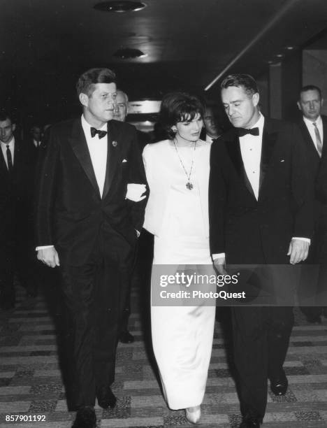 American politician President John F Kennedy , First Lady Jacqueline Kennedy , and their brother-in-law, Director of the Peace Corps Sargent Shriver...