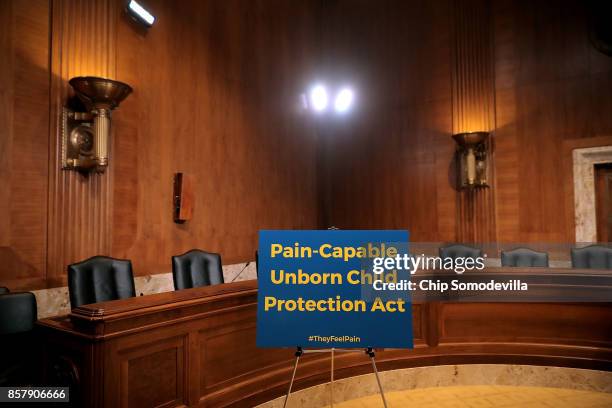 Sign awaits Sen. Lindsey Graham before he introduces the Senate version of the 'Pain Capable Unborn Child Protection Act' before a news conference...