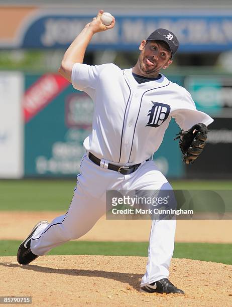 Scott Williamson of the Detroit Tigers pitches against the Washington Nationals during the spring training game at Joker Marchant Stadium on March...