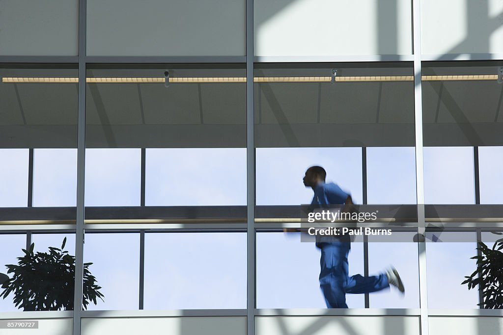 Doctor Running Down Hallway
