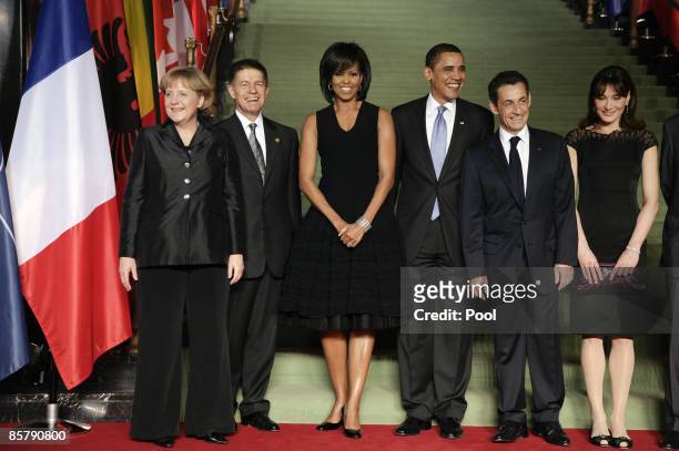 German Chancellor Angela Merkel, her husband Joachim Sauer, U.S First Lady Michelle Obama, U.S. President Barack Obama, French President Nicolas...
