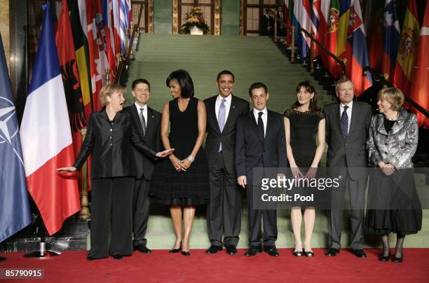 German Chancellor Angela Merkel, her husband Joachim Sauer, U.S First Lady Michelle Obama, U.S. President Barack Obama, French President Nicolas...