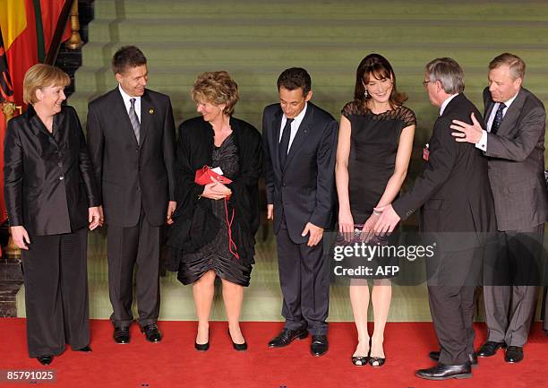 German Chancellor Angela Merkel, her husband Joachim Sauer, wife of Luxembourg Premier Jean-Claude Juncker Christiane Frising, French President...