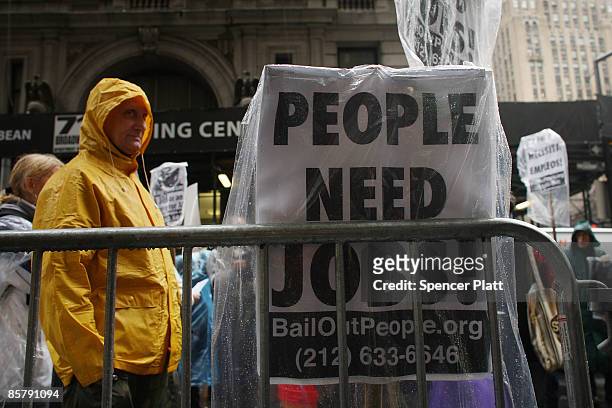 People demonstrate in the financial district on April 3, 2009 in New York, New York. Dozens of anti-capitalist protesters gathered in the financial...