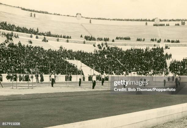 The German team have just competed their exhibition on the horizontal bar and look toward their leader, Fritz Hoffman during the First Summer Olympic...
