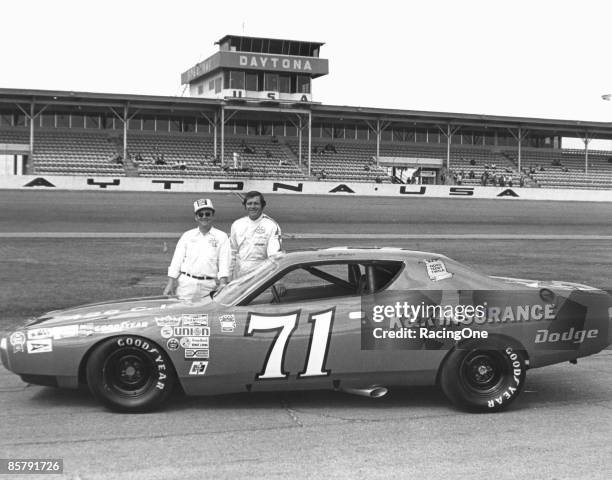Buddy Baker stands with crew chief Harry Hyde as he began the 1973 NASCAR Cup Series season driving for the K&K Insurance team, owned by Nord...
