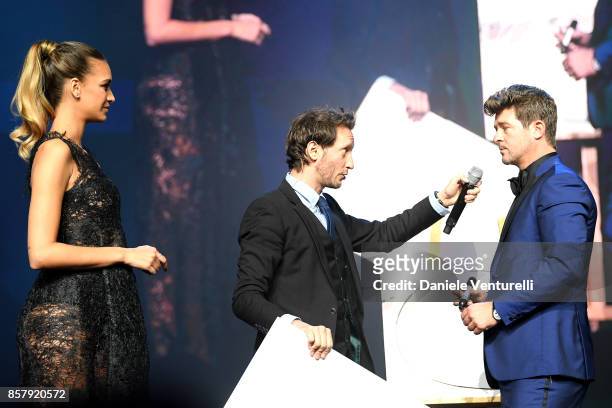 Robin Thicke , April Love Geary and Lior Suchard perform on stage at the auction for the inaugural "Monte-Carlo Gala for the Global Ccean" honoring...