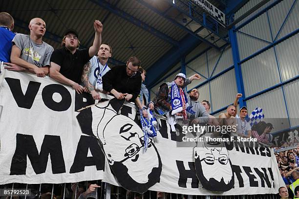 Supporters of Schalke show a protest banner during the Bundesliga match between Arminia Bielefeld and FC Schalke 04 at the Schueco Arena on April 3,...