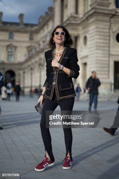 Leandra Medine is seen attending Louis Vuitton during Paris Fashion Week wearing Chanel and Celine on October 3, 2017 in Paris, France.