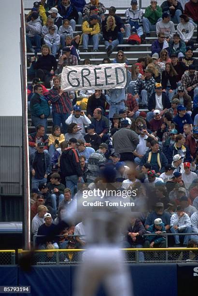 Post MLB Strike: View of fan in stands holding GREED sign during game Milwaukee Brewers vs Chicago White Sox game. Milwaukee, WI 4/26/1995 CREDIT:...
