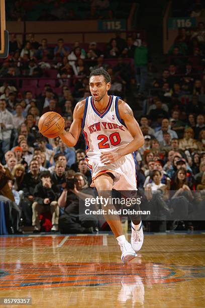 Jared Jeffries of the New York Knicks dribbles the ball downcourt against the Sacremento Kings on March 20,2009 at Madison Square Garden in New York...