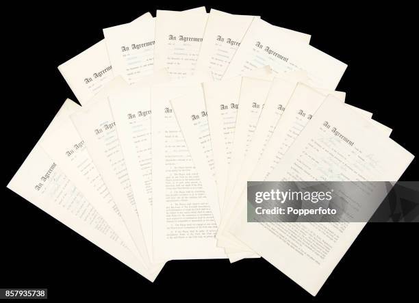 Collection of 24 signed professional playing agreements for Manchester United footballers from the Busby Babes era, circa 1954 to 1956. Included are...