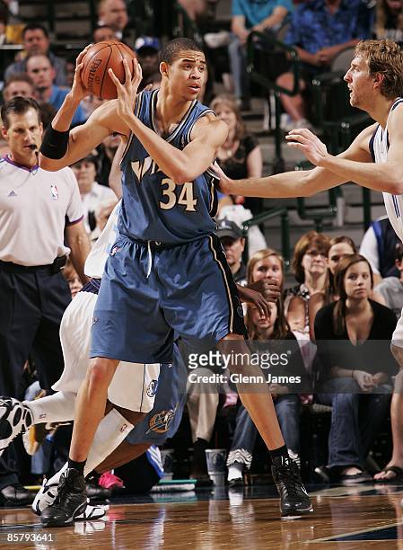 JaVale McGee of the Washington Wizards looks to move the ball against the Dallas Mavericks during the game on March 7, 2009 at the American Airlines...