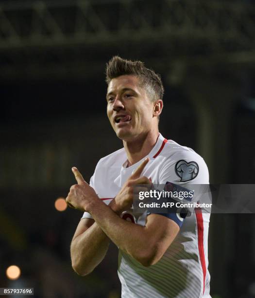 Poland's forward Robert Lewandowski celebrates during the FIFA World Cup 2018 qualification football match between Armenia and Poland in Yerevan on...