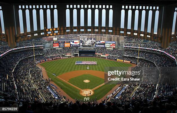 General view of Yankee Stadium during the playing of the National Anthem before the New York Yankees game against the Chicago Cubs at Yankee Stadium...