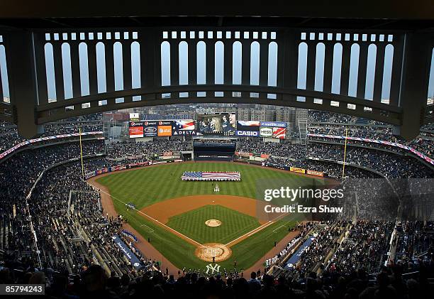 General view of Yankee Stadium during the playing of the National Anthem before the New York Yankees game against the Chicago Cubs at Yankee Stadium...