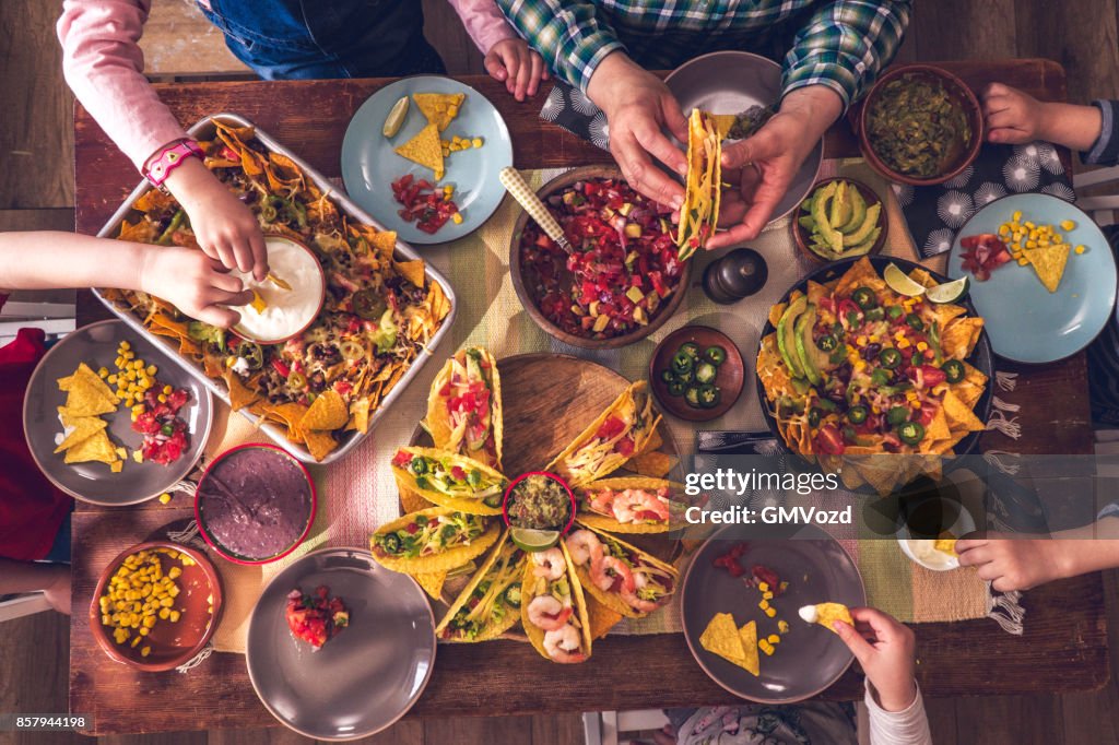 Variation of Mexican Tacos with Spicy Salsa and Nacho Tortilla Chips