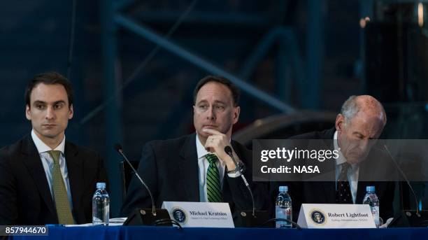 In this NASA handout image, acting NASA Administrator Robert Lightfoot, center, along with Deputy Chief Technology Officer of the United States...