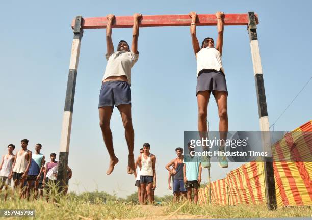 Candidates take part in a physical fitness test at an Indian Army recruitment rally at Khasa near Amritsar on Thursday. October 5, 2017.