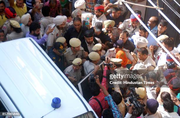 Honeypreet Insan being taken into a in car after been taken to house in Nayi Basti suspected to be her hideout on October 5, 2017 in Bathinda, India....